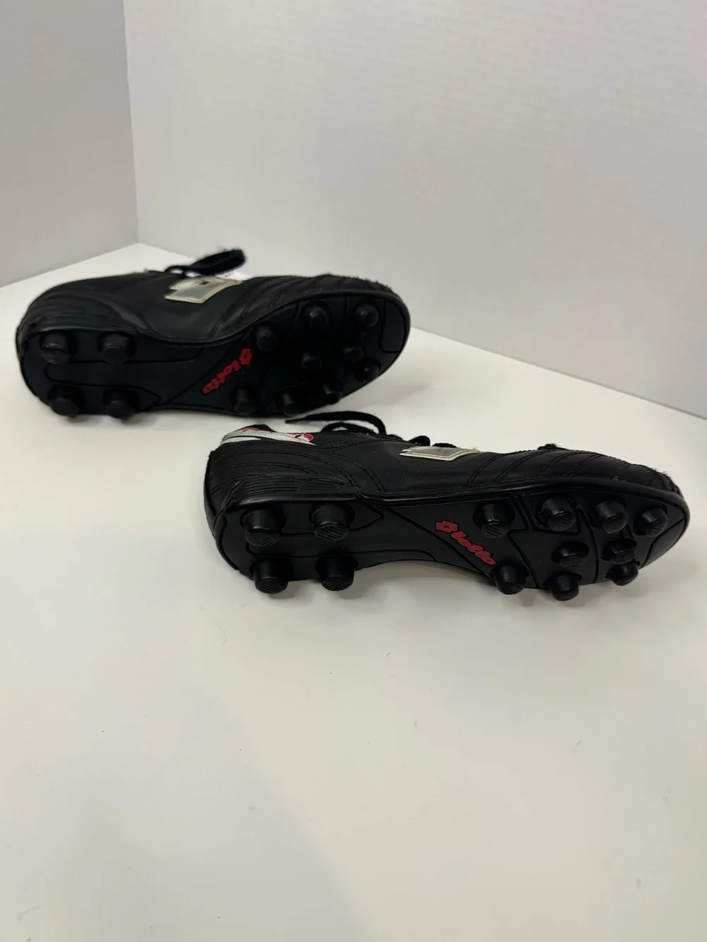 Kids Black Soccer Cleats with Red Details